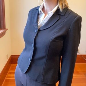 Black semi-fitted fully lined jacket, by Cleo Size 4